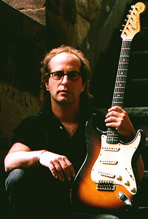 Bruce Bartlett playing guitar
